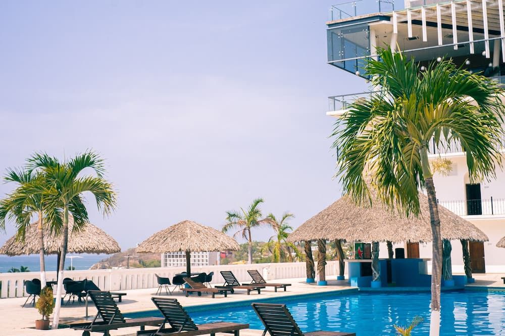 Hotel Caracol Plaza - פוארטו אסקונדידו - בריכה
