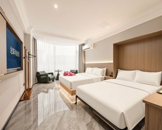 Longdu Impression Hotel (Zigong Lantern Park Branch) - Zigong - Bedroom