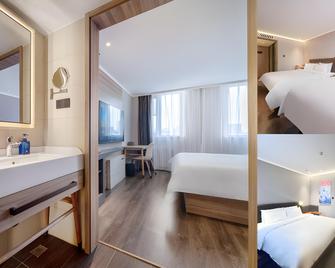 Hanting Hotel Hohhot Gulou - Hohhot - Schlafzimmer