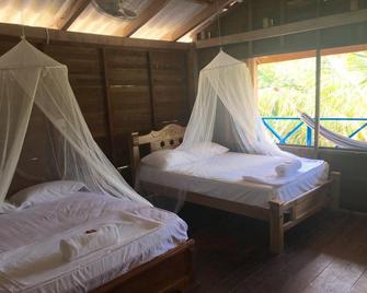 Eco Hostal Playa Libre - Eco-Hostel Isla Grande - Isla Grande del Rosario - Bedroom