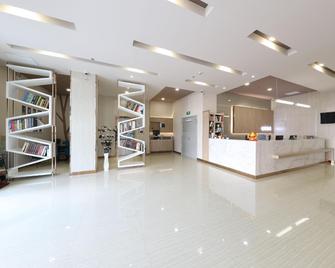 Grace Inn (Linyi Tongda Road Hexie Plaza) - Linyi - Front desk