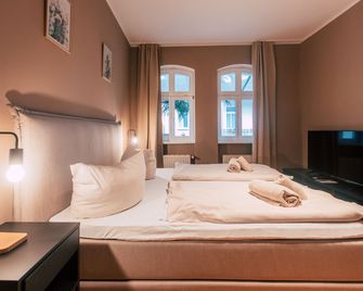 لوجا هومز - تشوسيهاوس - ليبزيغ - غرفة نوم