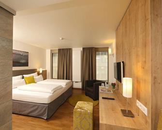 Hotel Goldenes Rad - אולם - חדר שינה