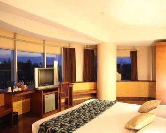 Hotel Oval - Surabaya - Bedroom