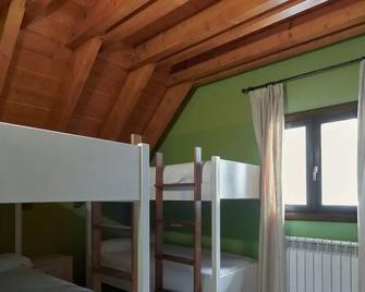 Apartahotel Tres Quiñones - Sallent de Gállego - Bedroom