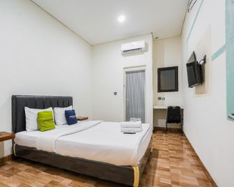 Urbanview Hotel Aloevera Pontianak by RedDoorz - Pontianak - Slaapkamer