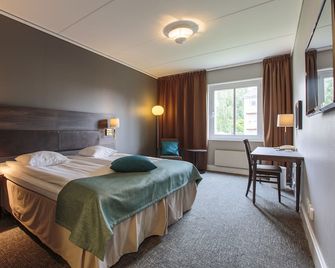 Home Hotel Uman - Umeå - Bedroom