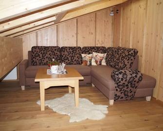 Vacation apartment Schober Alm with 2 bedrooms, 2nd floor, balcony, 66 sqm - Nußdorf am Inn - Wohnzimmer
