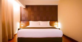 Prime Park Hotel Pekanbaru - Pekanbaru - Bedroom