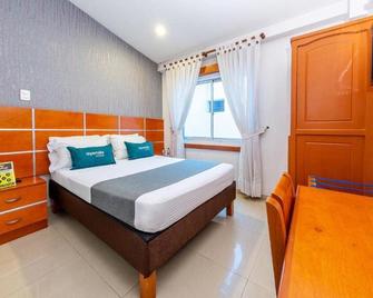 Optimum Hotel - Pereira - Schlafzimmer