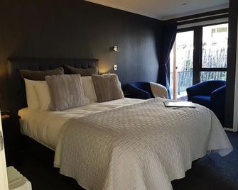 هيتا بد آند بريكفاست - نيو بليموث - غرفة نوم