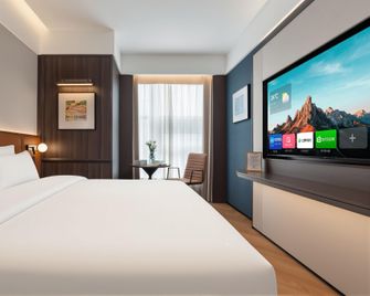 Manston Preferred Hotel (Wuhu Wanchun Commercial Plaza) - Wuhu - Makuuhuone