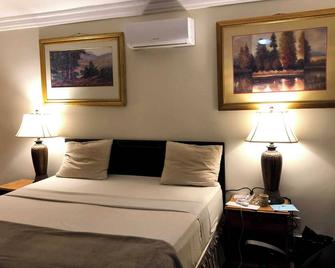 Hotel Mallika Company, Sl - Freetown - Schlafzimmer