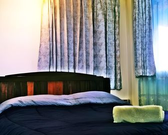 Surada Guesthouse - Udon Thani - Slaapkamer