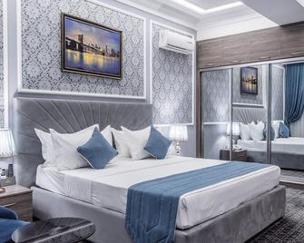 The Royal Mezbon Hotel & Spa - Taschkent - Schlafzimmer
