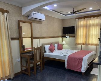 سامرفيل بيتش ريزورت - كاندوليم - غرفة نوم