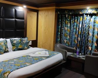 Hotel Zahgeer Continental Gulmarg - Gulmarg - Habitación