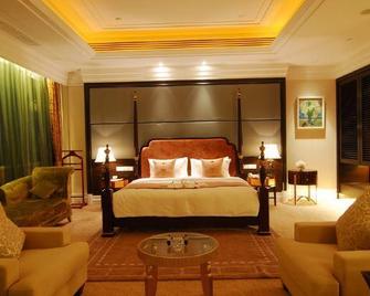 Haikou Tianyou Hotel (West Coast Holiday Beach) - Haikou - Habitación