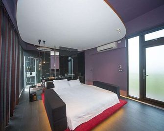 Wan Qu Villa Homestay - Dongshan Township - Спальня