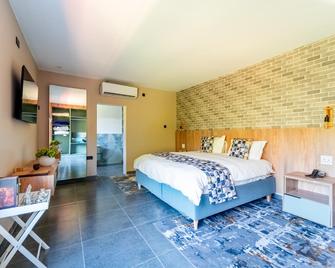 The Outlook @ Victoria Falls - شلالات فيكتوريا - غرفة نوم