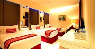 G'Sign Hotel Banjarmasin - Banjarmasin - Bedroom
