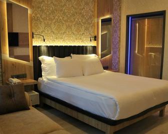 Isnova Hotel - Antalya - Schlafzimmer