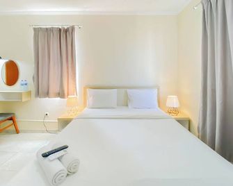 Spacious and Cozy Studio Grand Palace Kemayoran Apartment By Travelio - Yakarta - Habitación