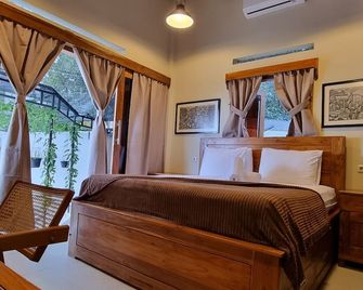 UtopiaKu, a unique homestead in the stunning highlands of Munduk, Bali. - Banjar - Bedroom