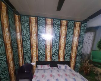 Hotel O Radhika Guest House - Bhiwāni - Bedroom