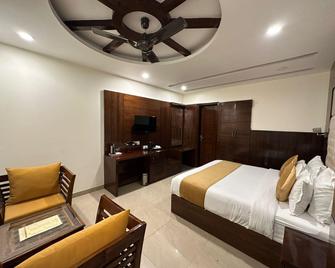 Hotel Blue Orchid - Zerakpur - Slaapkamer