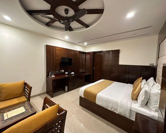 Hotel Blue Orchid - Zerakpur - Slaapkamer