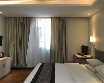 Guangzhou Minghong Hotel -Xiwan - Cantón - Habitación