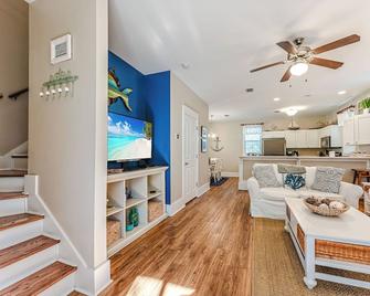 Barefoot Getaway is your perfect poolside paradise!\n - Port St. Joe - Living room
