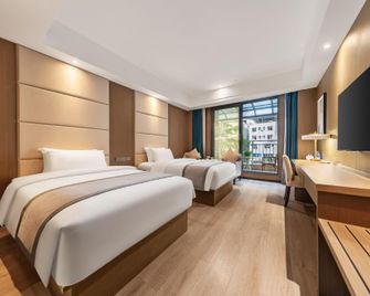 Ziyun Hotel - Mianyang - Habitación
