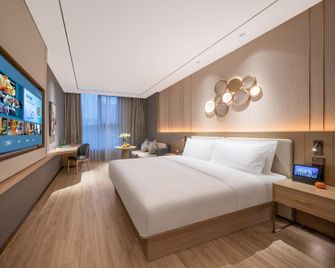 Orange Hotel Qingdao Wusi Square 3rd Yan'an Road - Qingdao - Bedroom