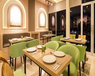 Yulia Hotel Managed By Hig - Gorontalo - Restaurant