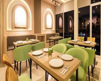 Yulia Hotel Managed By Hig - Gorontalo - Restaurant