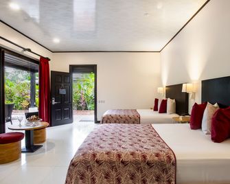 Arenal Manoa Resort & Hot Springs - לה פורטונה - חדר שינה