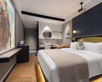 Baitang Hotel Lab (Changsha Wuyi Square Branch) - Changsha - Schlafzimmer
