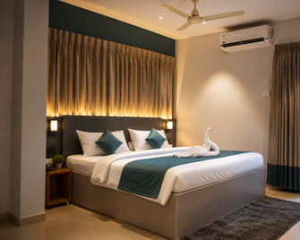 Hitech Delite - Stay And Dine Hotel - Belgaum - Schlafzimmer