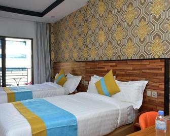 Centric Hotel - Kigali - Schlafzimmer