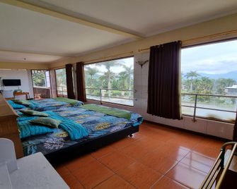Hotel Hikmat Indah - Lembang - Slaapkamer