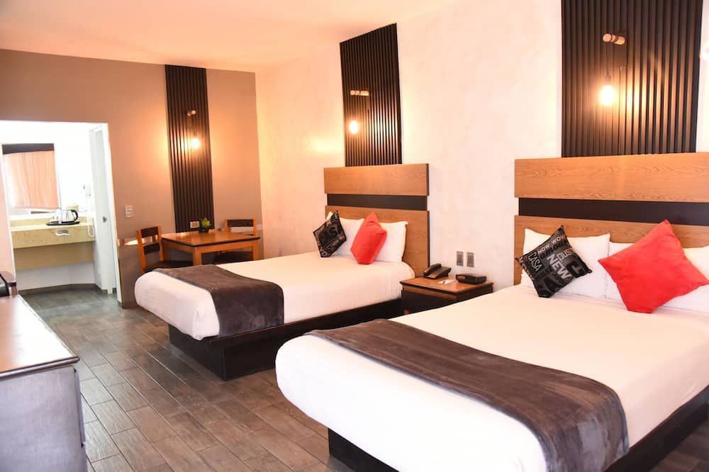 American Inn Hotel & Suites Parral - Parral - Slaapkamer