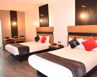 American Inn Hotel & Suites Parral - Parral - Slaapkamer