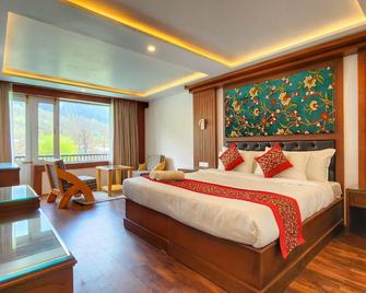 Hotel Himalaya House Pahalgam - Pahalgam - Camera da letto