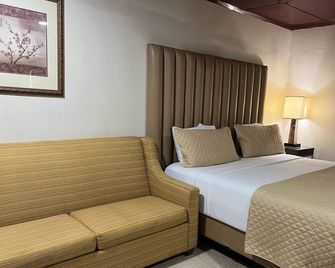The Stafford Lodge - 自由城 - 臥室