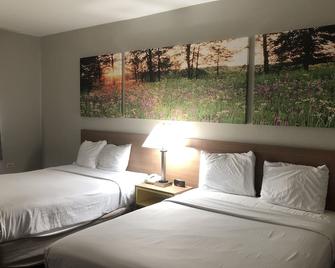 Days Inn & Suites by Wyndham Romeoville - Romeoville - Habitación