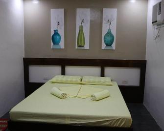Am's Apartelle - Tagbilaran - Schlafzimmer