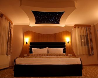 Grand Zeybek Hotel - איזמיר - חדר שינה