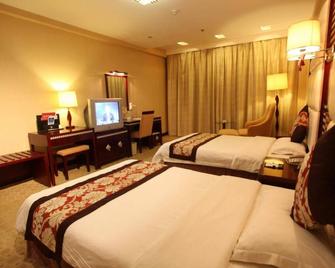 Hongluo Harbor Holiday Hotel - Xianyang - Camera da letto